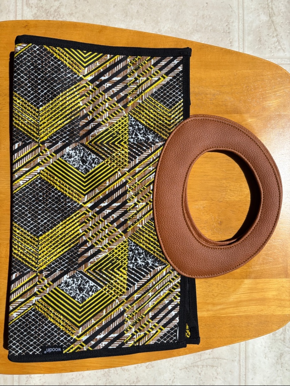 Geometric Print Clutch with Brown Leather Handle